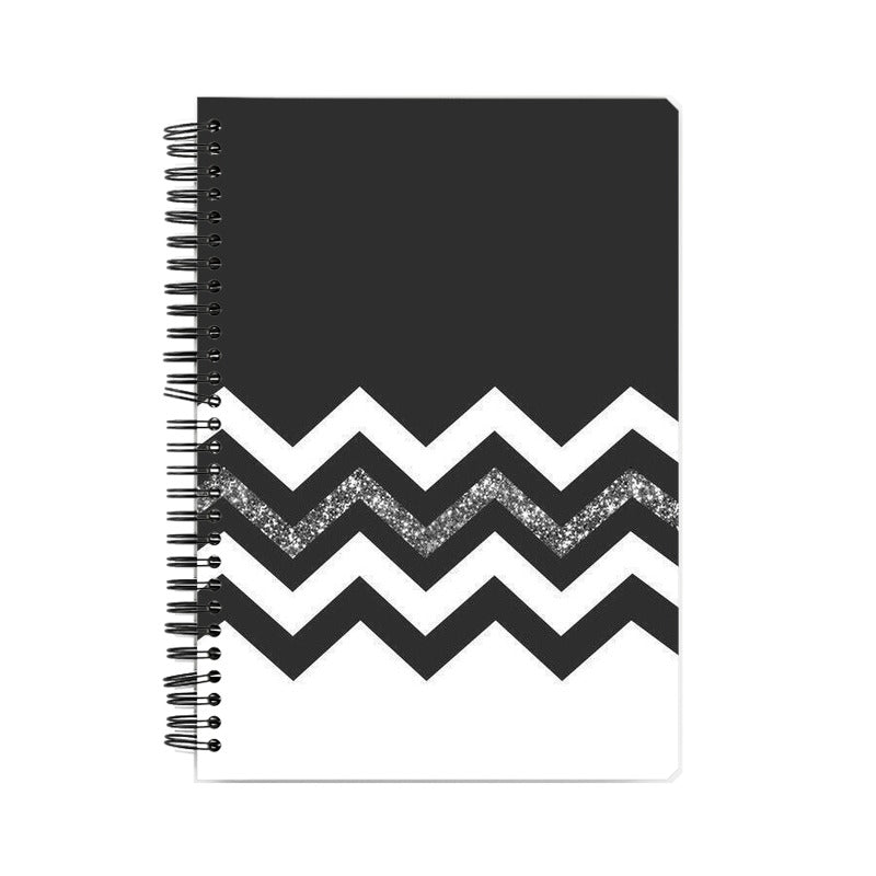 BLACK AND WHITE TRIANGLE NOTEBOOK